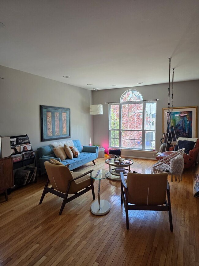 Photo - Stunning 3–4 Bedroom Townhome in Private Community | Garage + EV Charger | Deck with Tree Views