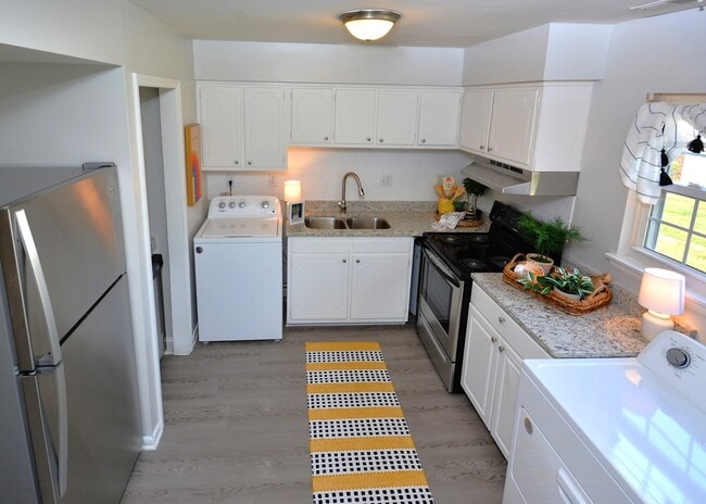 Kitchen in newly renovated Townhome at Trails End Apartments in Burlington, NC