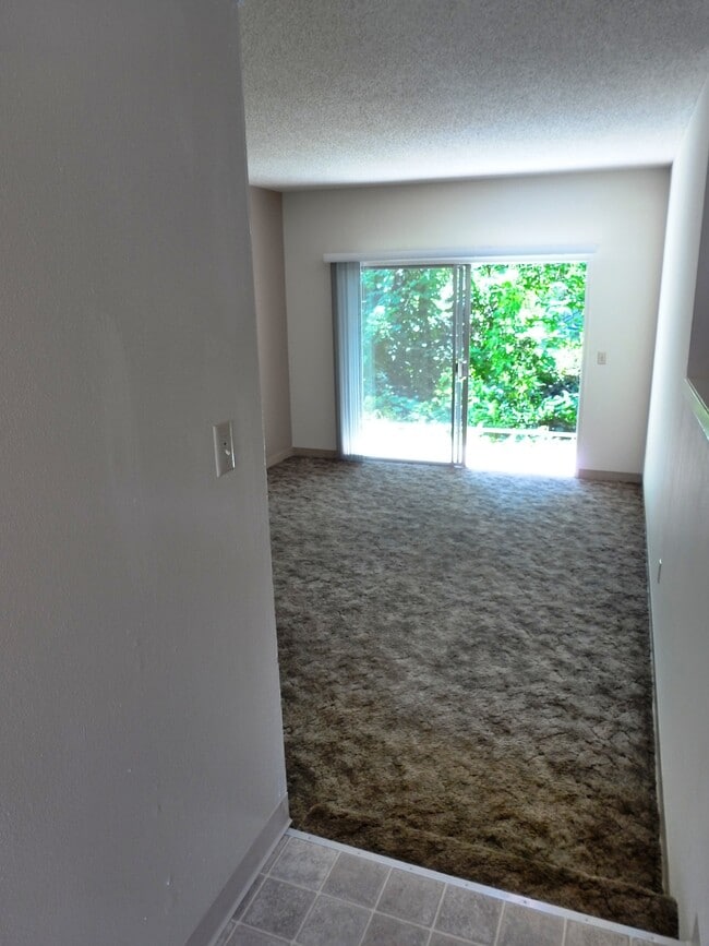 View into Living Room from hallway - Bidwell's Mill Apartments