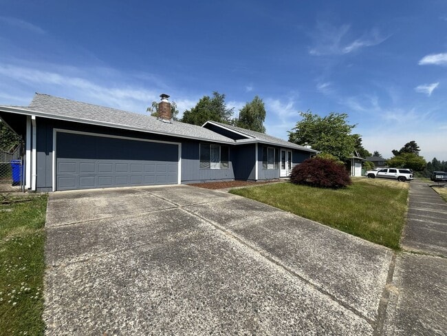 Photo - Charming Ranch Home with Sunroom or 4th Bedroom, Two-Car Garage and Fenced Backyard