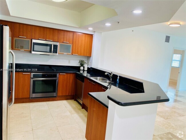 Building Photo - 15051 Royal Oaks Ln Unit 2002 Rental