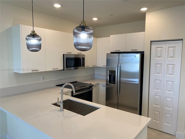 Photo - 6455 NW 103rd Pl Unit 303