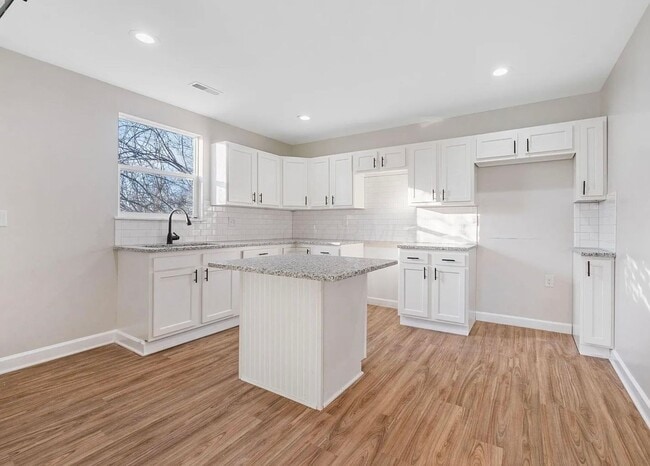Photo - Elegant 3 Bedroom Home with First-Floor Laundry and Modern Style