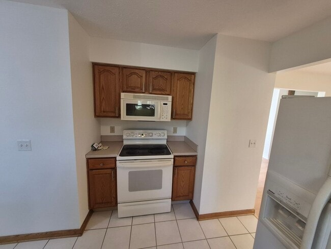 Photo - Charming 3BR 1.5BA Home w/ In-Unit Laundry + Central Air + Garage in Avon