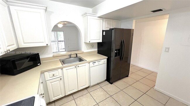 Photo - 711 N Pine Island Rd Unit 211