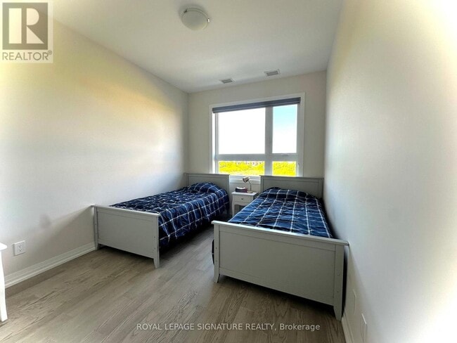 Photo - 3265 Carding Mill Trail Unité 206