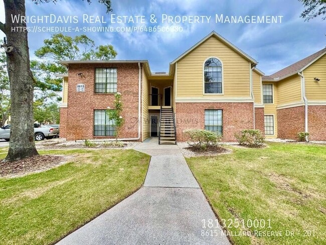 Building Photo - 8615 Mallard Reserve Dr Unit 201