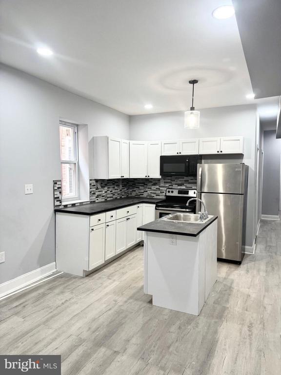 Building Photo - 5323 Walnut St Unit 1 Rental