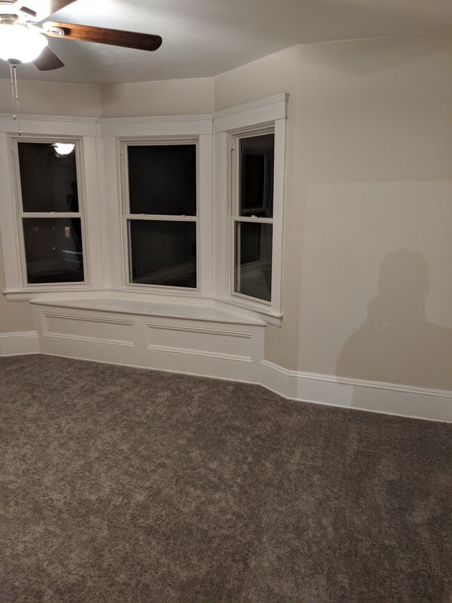 bay window in master bedroom with original built in storage - 1448 Lincoln Ave