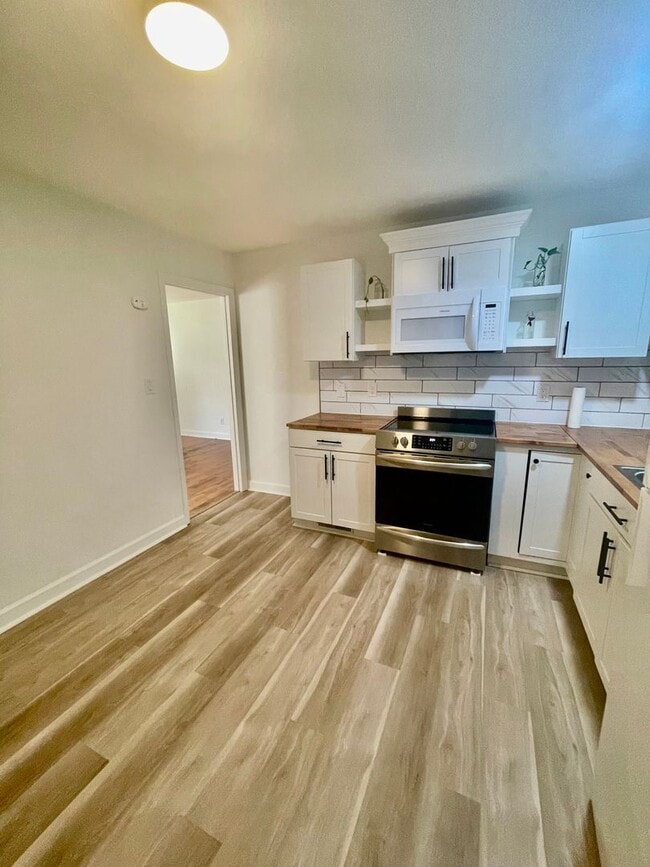 Photo - Newly renovated 3 bedroom 1 bath brick ranch home sitting on a large lot and on a quiet street i...