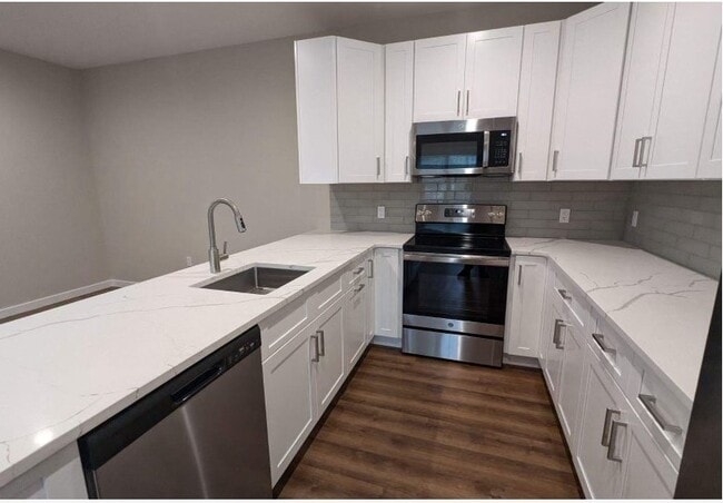 Townhouse White Stone Counters Featured in Apt# 102, #104 & #106