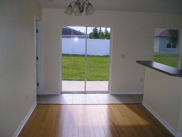 Photo - "Charming 3-Bedroom Haven with 2 Baths in Palm Coast – 1208 Sq Ft of Cozy Living!"