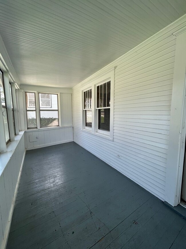 Photo - Charming 3-Bedroom Home with Finished Attic, Enclosed Front Porch & Spacious Backyard