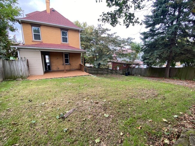 Photo - Updated 3-4 BR House with fenced yard & off street parking!