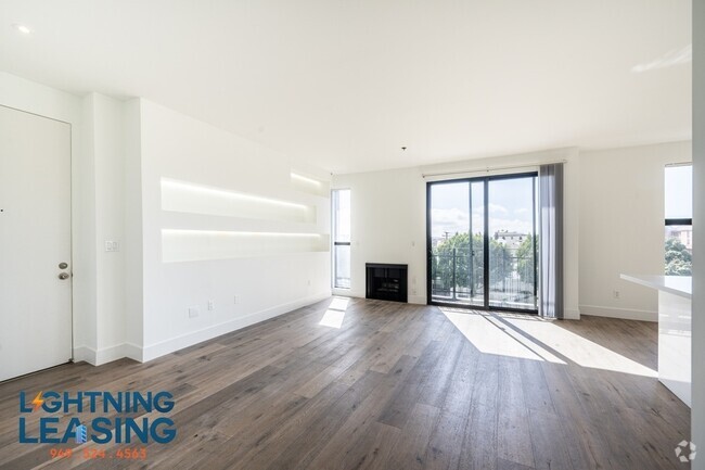 Building Photo - Stylish and spacious 2-bedroom plus den wi... Unit 402D Rental