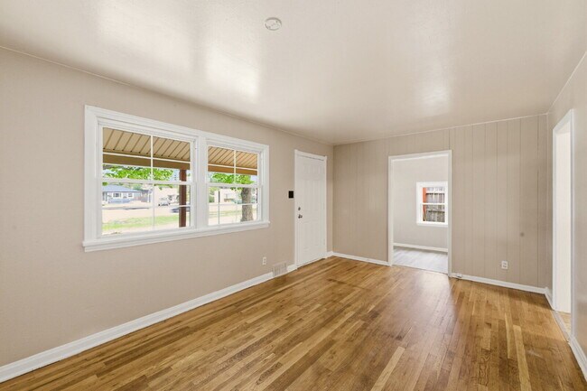 Photo - Four Bedroom Home In Aurora - ready ASAP. Brand New Paint Top to Bottom, with updated flooring!