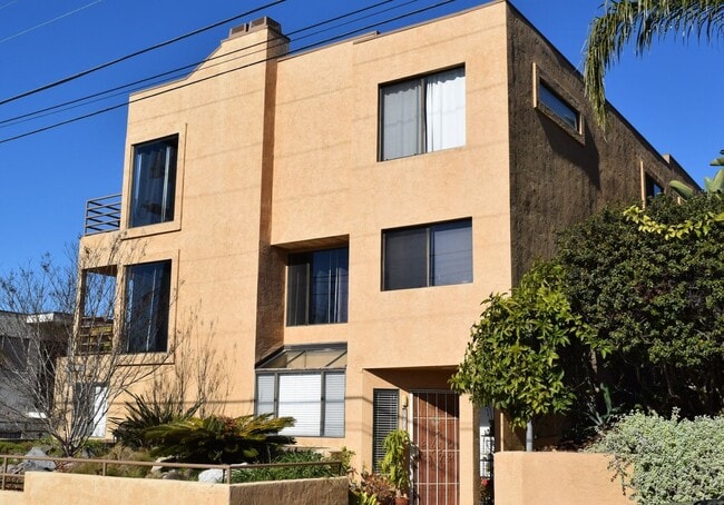 Building Photo - Modern 2 Bed 2.5Bath Townhome with Garage, Balconies & In-Unit Laundry in Linda Vista