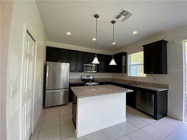 Photo - Beautiful End Unit Townhome Near Lake Nona w/ 2-Car Garage & Conservation Views!