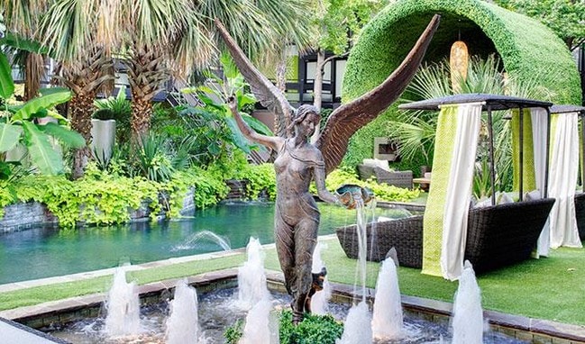 6011 Gaston - FOX TROTT Courtyard Angel Fountain - FOX TROTT