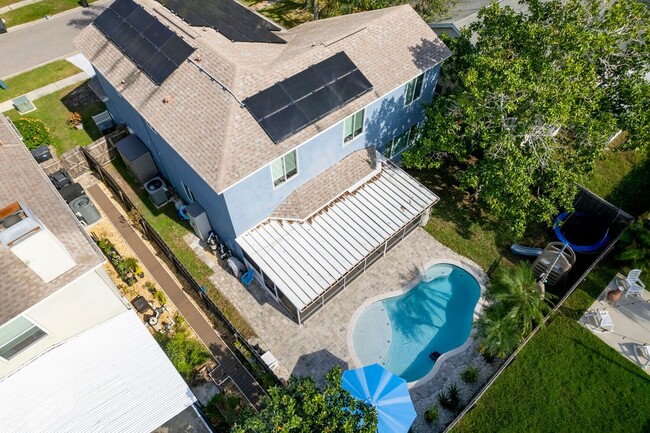 Photo - STUNNING 4-BED, 3-BATH HOME WITH SOLAR PANELS IN TAMPA, FL!