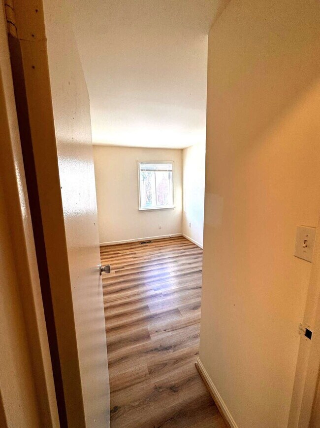 Photo - Sunlit 2BR/2BA Terrace Townhouses Gem with Pool, Assigned Parking & Pet-Friendly Vibes!