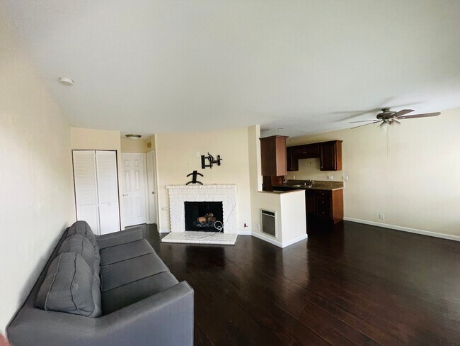 Living Spaces with view of fire place - 4185 Louisiana St Condo Unit 7
