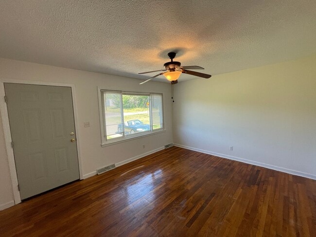 Photo - Freshly painted 3 bedroom 1.5 bath house with very large yard! Pet Friendly!