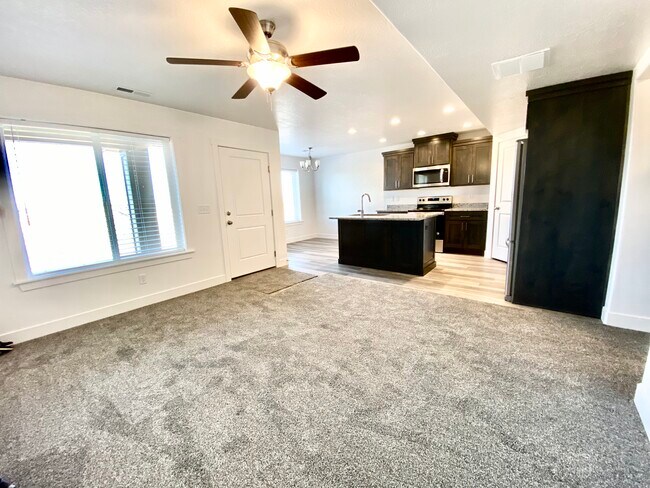 Open living room/kitchen/dining