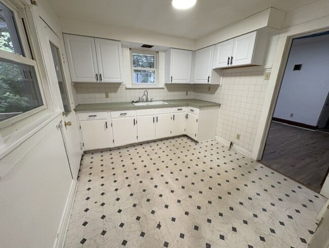 Photo - Updated West Akron Home with Flexible Living Space, Large Yard & Garage