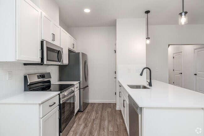 2BR, 2.5BA - 1,397SF - Kitchen - Evergreen Pointe