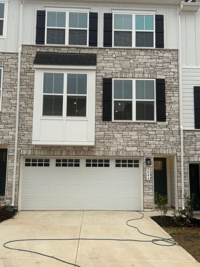Building Photo - Brand New 3-Story Townhome with 2-Car Gara...
