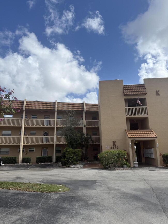 Building Photo - 6670 Royal Palm Blvd Unit 205k