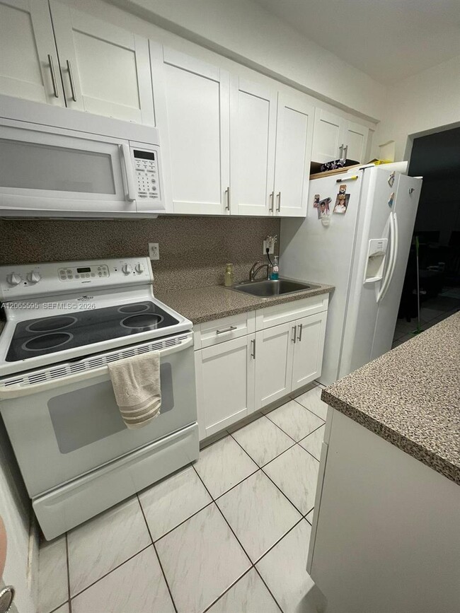 Photo - 3551 SW 11th St Unit 7B