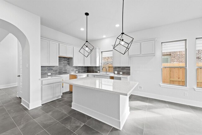 Photo - Two story. 4 bedrooms. 3.5 baths. Spacious...