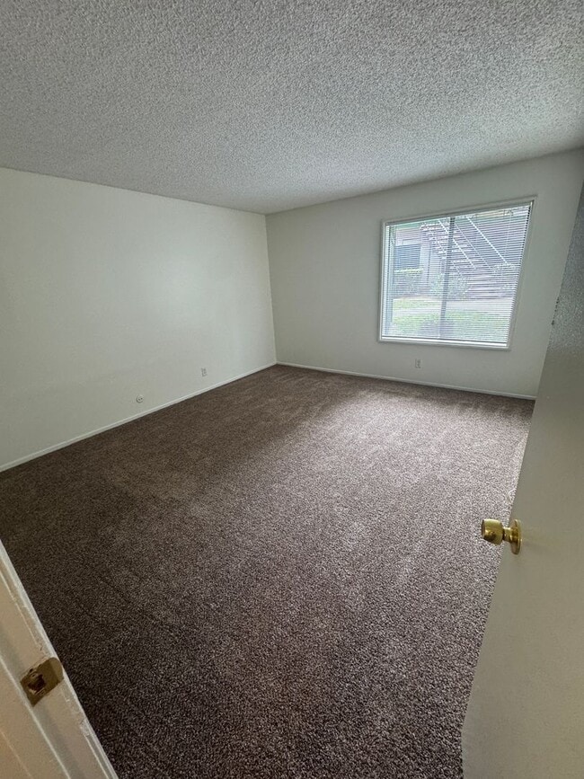 Photo - Resort-Style Condo Living with Pool Access & Community Amenities