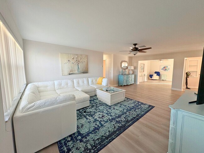 Photo - Spacious 3BR Home with Garage, Fenced Yard & Covered Patio in Seminole