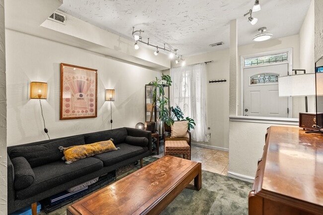 Building Photo - Charming Row Home | 2 Bed | 1 Bath | 950 Sf | Fenced Backyard | 2 Surface Parking Spaces