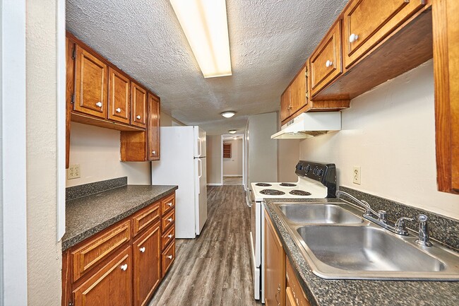 Photo - Coming Soon: 2 BR unit that includes water, trash, and yard care. Unit C