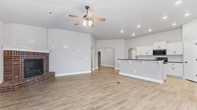 Photo - "Spacious 4-Bed Gem with Granite Elegance & Cozy Fireplace in Bentonville!"