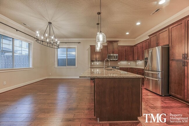 Photo - Spacious 4 BD Home with Private Backyard & Community Amenities!