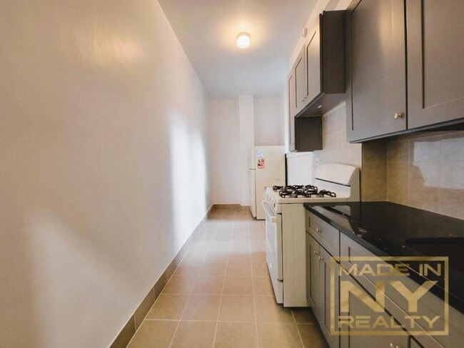 Building Photo - 0 bedroom in REGO PARK NY 11374 Unit LA
