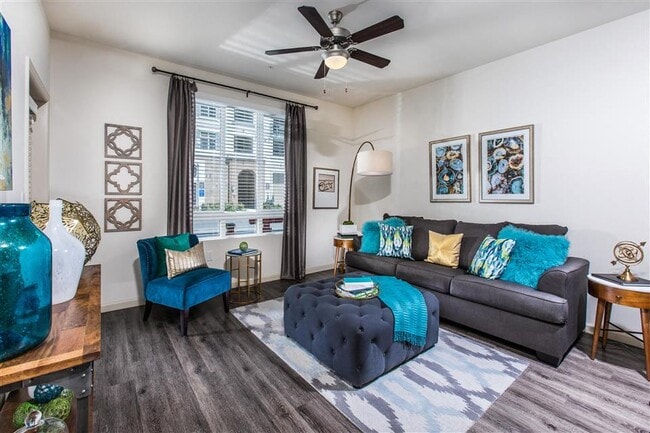 Select homes feature wood-look flooring in the living spaces