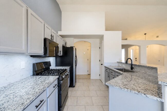 Photo - 3 BR/2BA | Newly Renovated Single Family Home | 3-Car Garage | Private backyard