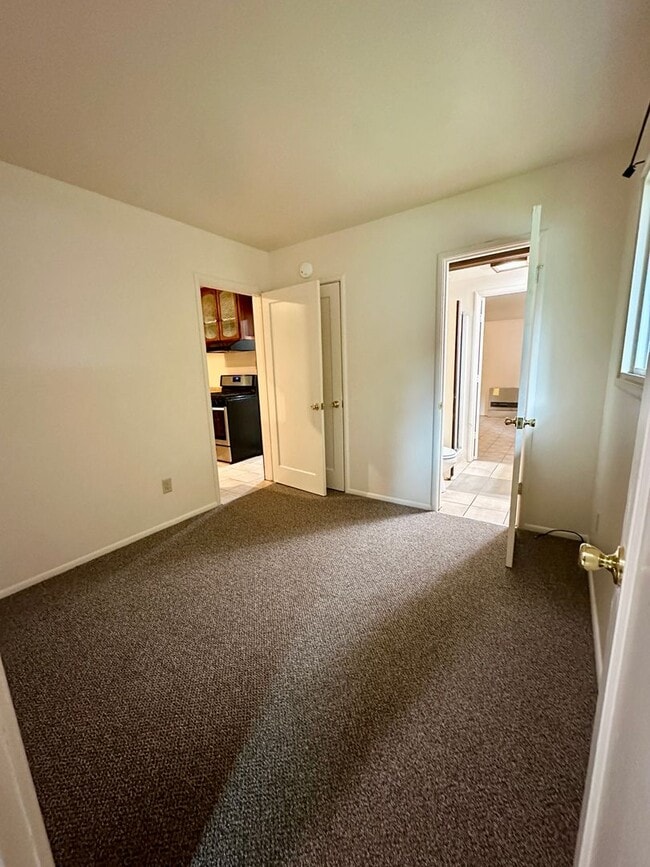 Photo - Spacious 4-Bedroom Home with Bonus Room in...