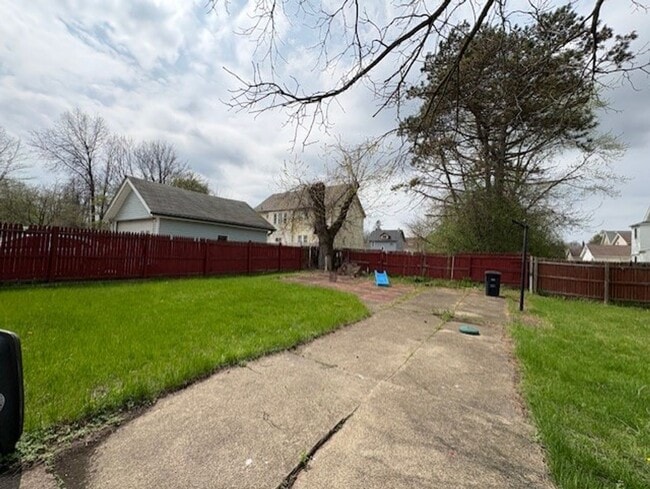 Photo - Spacious 4-Bedroom Akron Home with Charming Kitchen Nook & Backyard & Pet Friendly