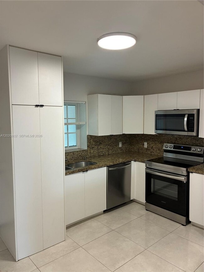 Building Photo - 1135 92nd St Unit 102