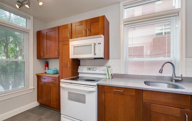 Photo - Spacious and sunlit condo located in the h...