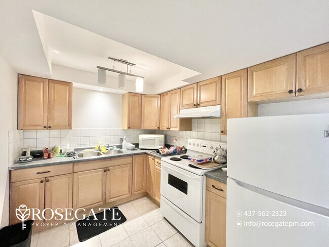 Photo - Spacious 2-Bedroom Basement Apartment with... Unit 2