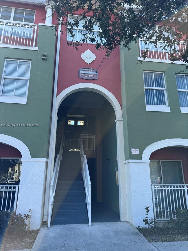 Building Photo - 11202 NW 83rd St Unit 212