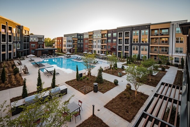 Resort-style Swimming Pool with Tanning Ledge and Sundeck